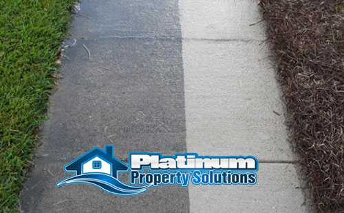 pressure wash concrete removes dirt stains and rust