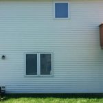 clean vinyl siding with soft washing service in west michigan