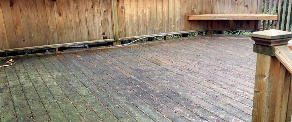 deck cleaning service in grand rapids michigan uses softwashing instead of pressure washing to refinish wood deck