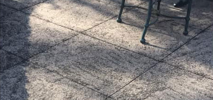 west michigan concrete patio cleaning service on dirty cement