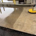 cleaning a concrete pad on a commercial driveway in grand rapids, mi