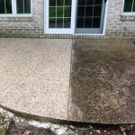 before and after of platinum property solutions concrete patio cleaning in grand rapids, michigan