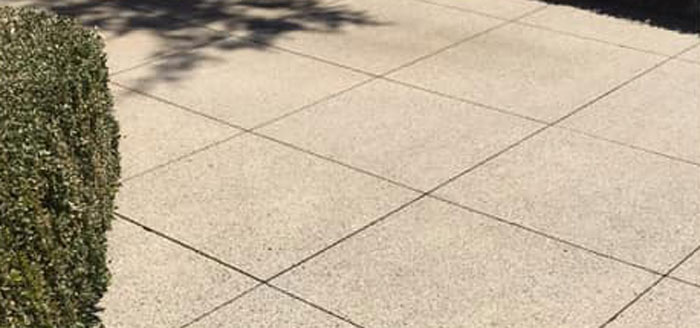grand rapids concrete cleaning service removes dirt and stains from driveways and patios