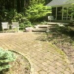 concrete pavers before pressure washing