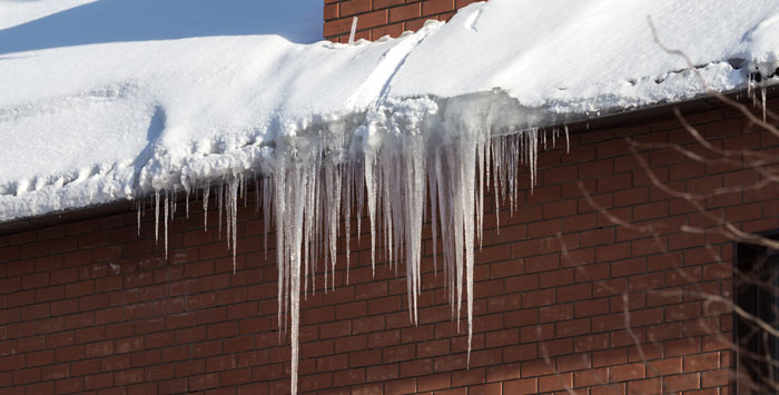 removing ice dams on house in grand rapids michigan